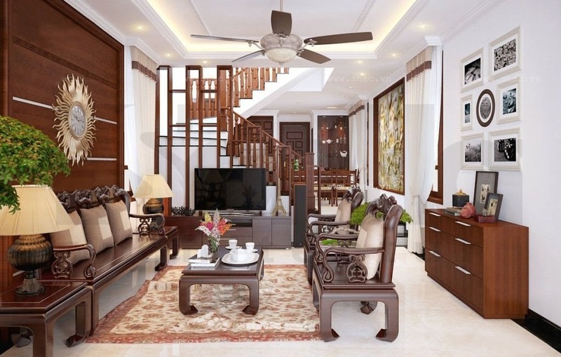 Không gian phòng khách sử dụng rất nhiều chất liệu gỗ, kết hợp với một số chậu cảnh mini trong góc tạo sự sinh động cho không gian