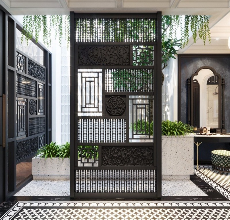Các họa tiết hoa lá quả được khắc vô cùng tỉ mỉ trên vách ngăn nội thất mang phong cách Indochine