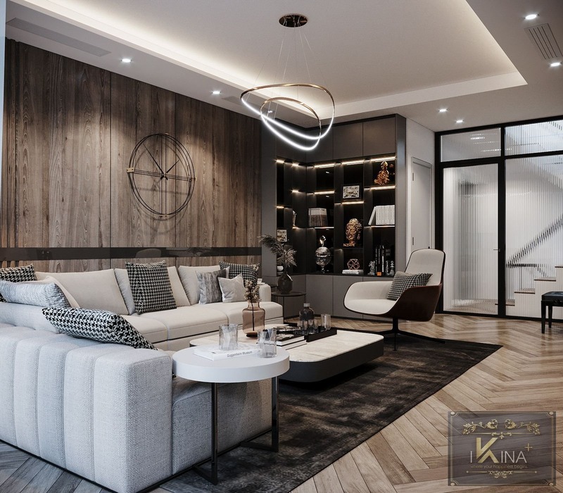 Không gian phòng khách với tâm điểm là bộ sofa màu trắng lớn